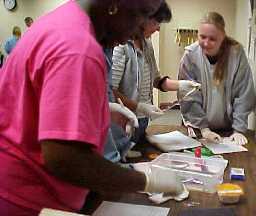 students search a prisoner property box